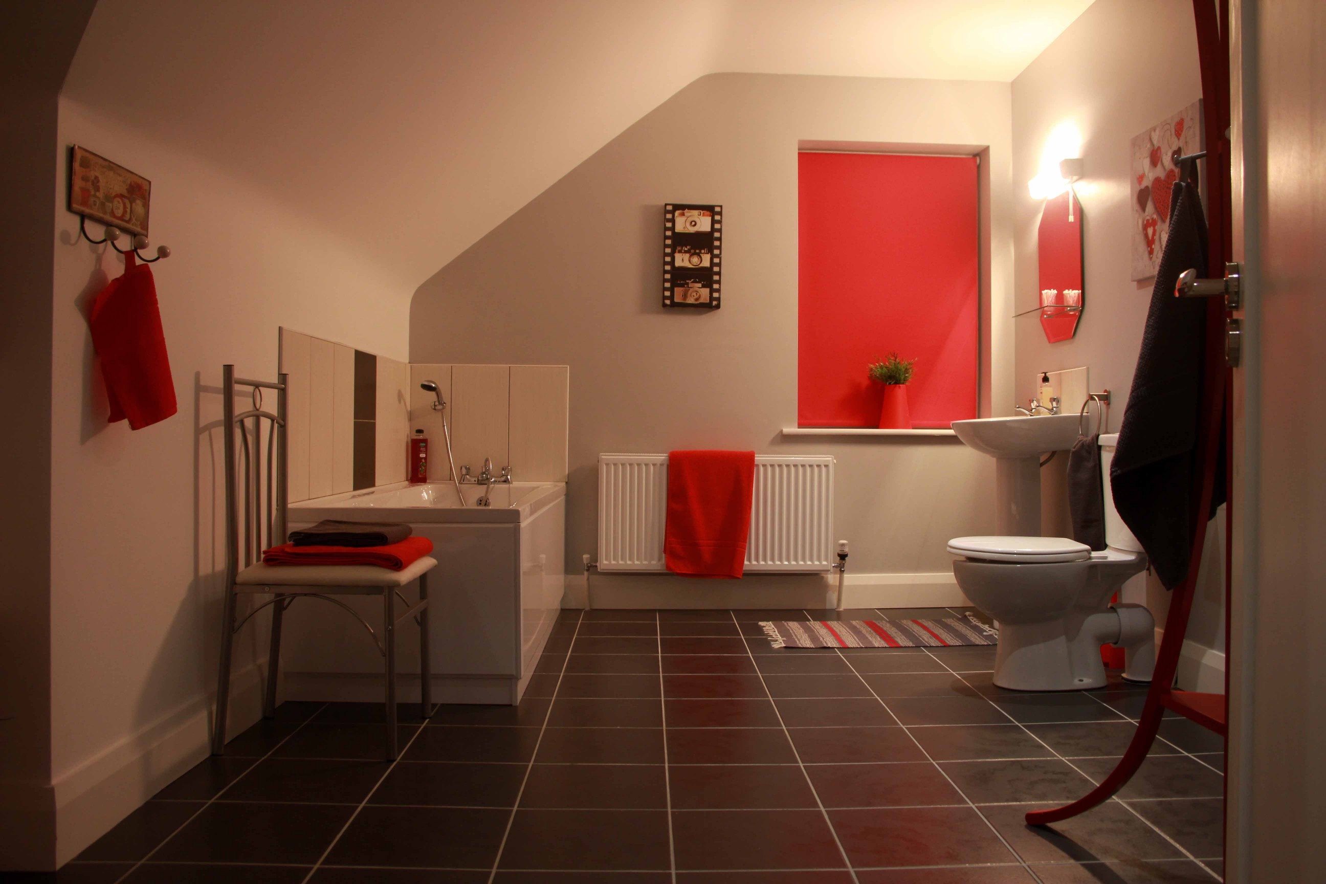Red Room Full Bathroom with walk in shower